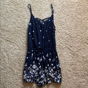 navy blue floral pattern romper from garage